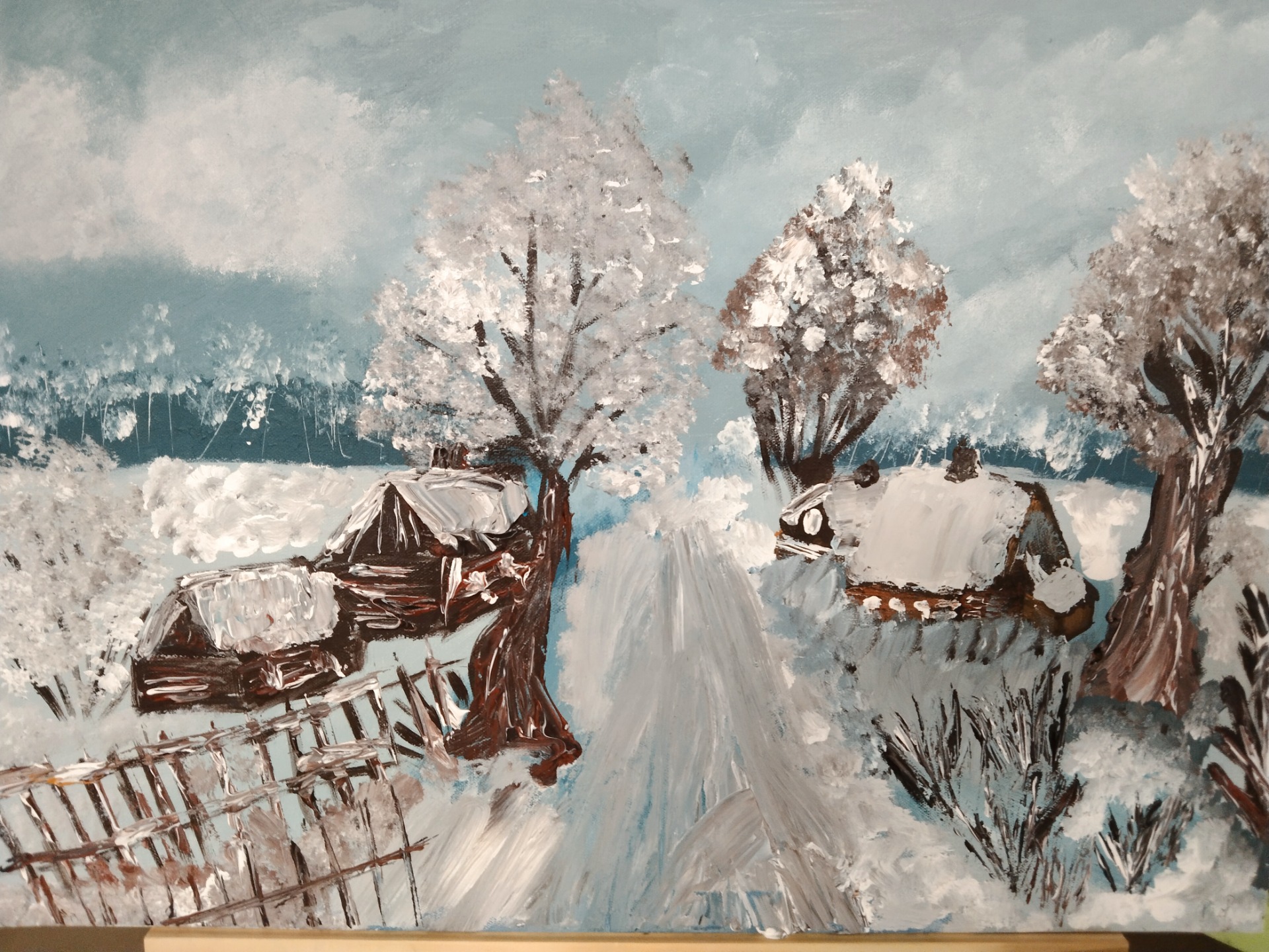 obraz malowany akrylami na płótnie przedstawiający pejzaż zimowy na wsi